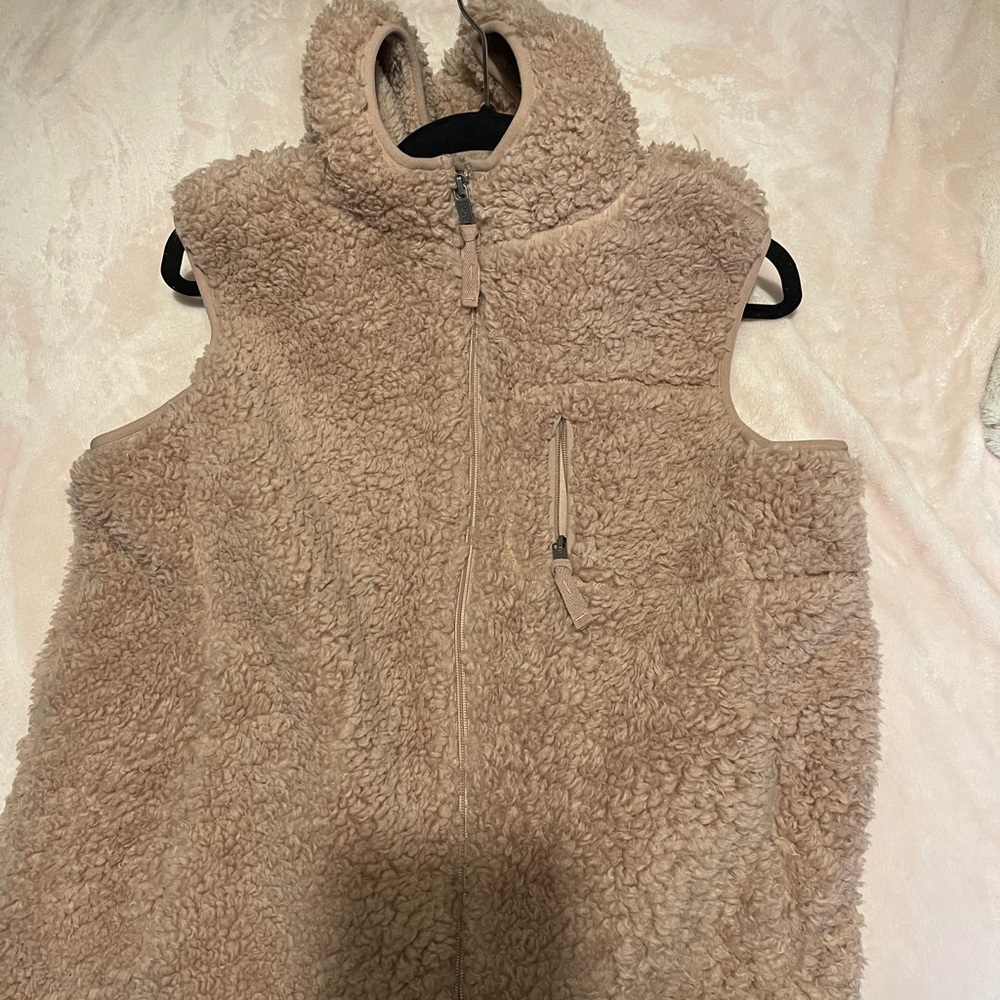 pink fluffy vest with hood